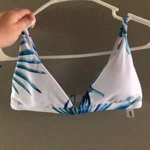 A tropical whit and blue bikini top